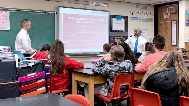 Bank of Albuquerque employee volunteers enjoy teaching students about financial literacy.